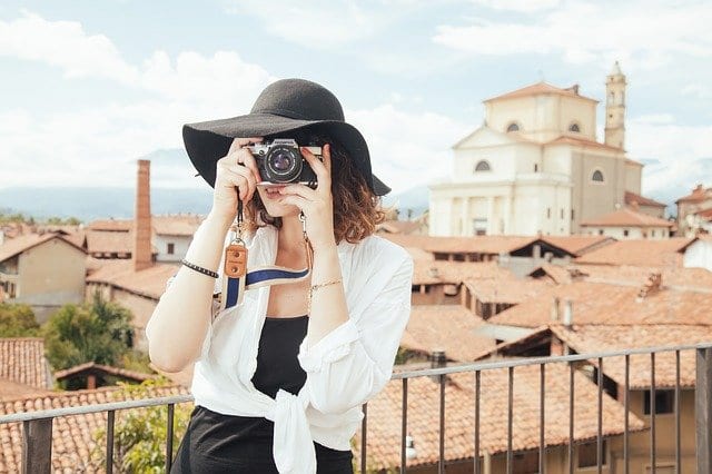 Girl taking a photo while traveling