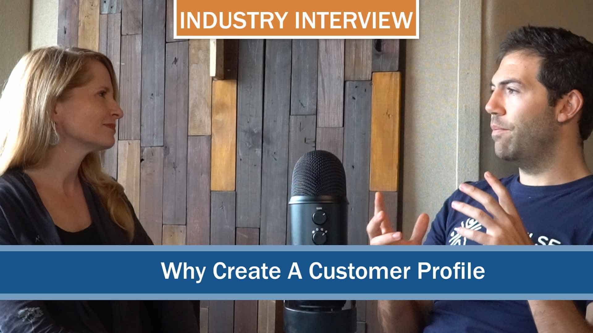 Picture of an interviewer and interviewee discussing why you should create a customer profile