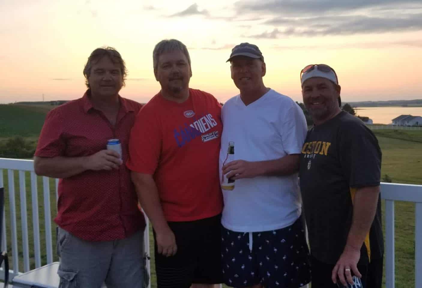 picture of guys on vacation, faces are too dark