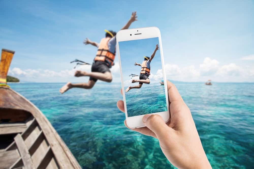 take better pictures, specifically of guest photos - as shown a man jumping out of a boat getting his photo taken.